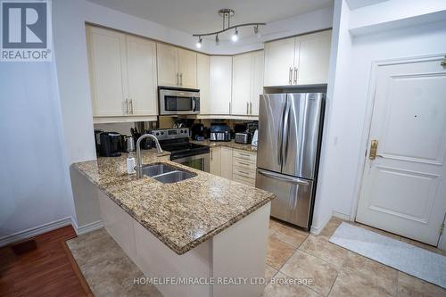 303 - 9235 Jane Street, Vaughan (Maple), ON - Indoor Photo Showing Kitchen With Stainless Steel Kitchen With Double Sink