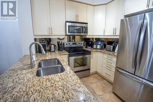 303 - 9235 Jane Street, Vaughan (Maple), ON - Indoor Photo Showing Kitchen With Stainless Steel Kitchen With Double Sink