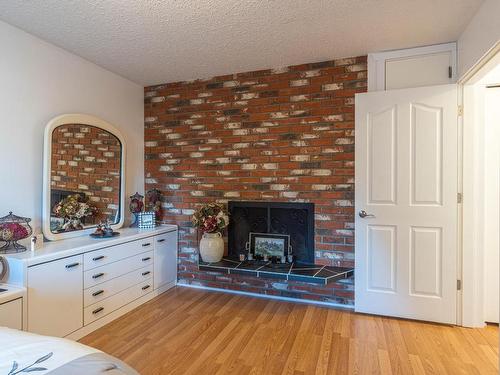 2120 Omineca Drive, Kamloops, BC - Indoor With Fireplace