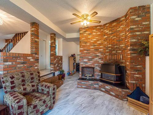 2120 Omineca Drive, Kamloops, BC - Indoor Photo Showing Living Room With Fireplace