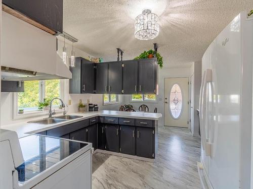 2120 Omineca Drive, Kamloops, BC - Indoor Photo Showing Kitchen With Double Sink