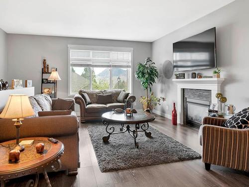 128-1939 Coldwater Drive, Kamloops, BC - Indoor Photo Showing Living Room With Fireplace