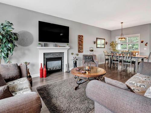 128-1939 Coldwater Drive, Kamloops, BC - Indoor Photo Showing Living Room With Fireplace