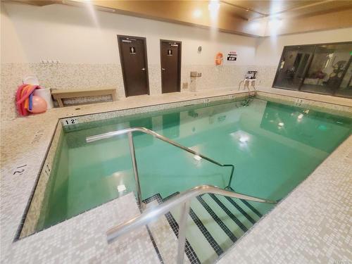 205-194 Beachside Dr, Parksville, BC - Indoor Photo Showing Other Room With In Ground Pool