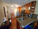 205-194 Beachside Dr, Parksville, BC  - Indoor Photo Showing Kitchen With Double Sink 