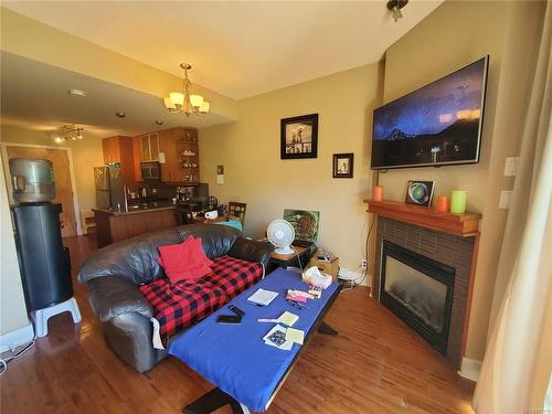 205-194 Beachside Dr, Parksville, BC - Indoor Photo Showing Living Room With Fireplace