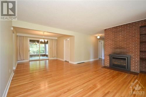 58 Rebecca Crescent, Ottawa, ON - Indoor Photo Showing Living Room With Fireplace