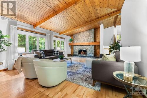 1560 Cumberland Ridge Drive, Cumberland, ON - Indoor Photo Showing Living Room With Fireplace