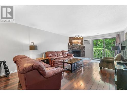 3020 Allenby Way Unit# 211, Vernon, BC - Indoor Photo Showing Living Room With Fireplace