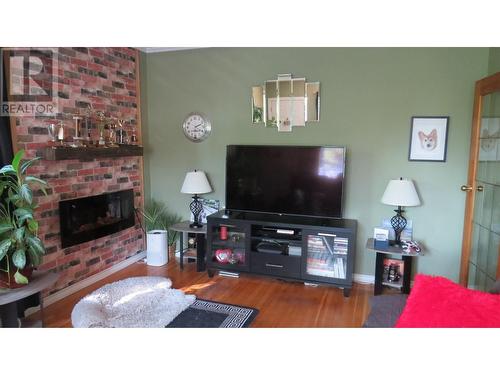 213 Baker Drive, Quesnel, BC - Indoor Photo Showing Living Room With Fireplace