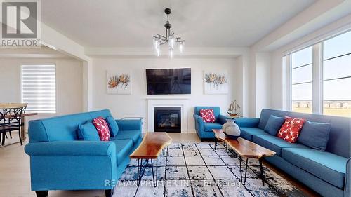 61 Conarty Crescent, Whitby, ON - Indoor Photo Showing Living Room With Fireplace