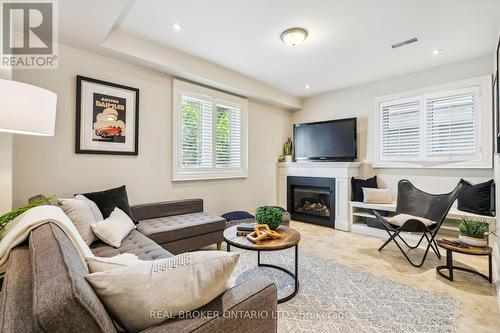 341 Broadway Avenue, Toronto (Mount Pleasant East), ON - Indoor Photo Showing Living Room With Fireplace