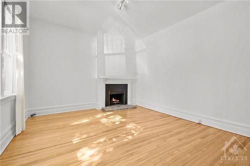 Large Living Room - 209 Daly Avenue Unit#2, Ottawa, ON - Indoor With Fireplace