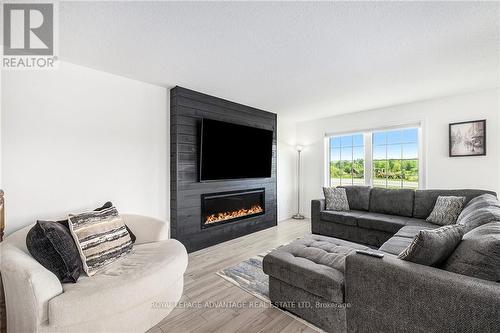 4152 Roger Stevens Drive, Montague, ON - Indoor Photo Showing Living Room With Fireplace