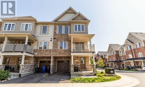 27 - 88 Decorso Drive, Guelph, ON - Outdoor With Balcony With Facade