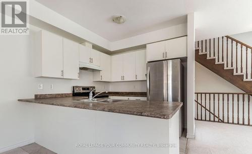 27 - 88 Decorso Drive, Guelph, ON - Indoor Photo Showing Kitchen With Double Sink