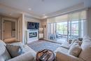 304-110 Ellis Street, Penticton, BC  - Indoor Photo Showing Living Room With Fireplace 