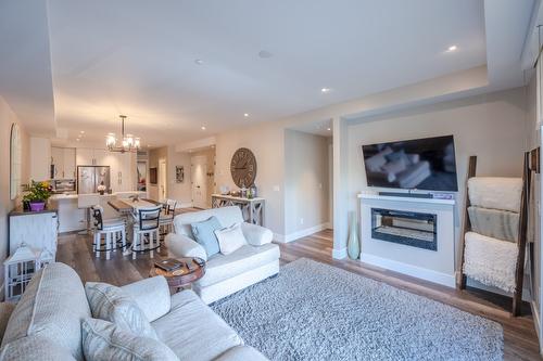 304-110 Ellis Street, Penticton, BC - Indoor Photo Showing Living Room With Fireplace