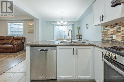 2711 Foxbend Link, London, ON - Indoor Photo Showing Kitchen With Double Sink