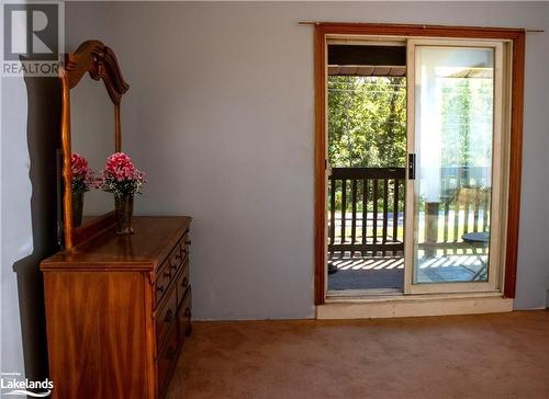 Primary Walkout to Covered Deck - 3410 Reservoir Road, Coldwater, ON - Indoor Photo Showing Other Room