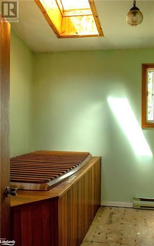 Upper Level Bath with Skylight - 3410 Reservoir Road, Coldwater, ON - Indoor Photo Showing Other Room