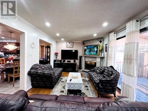 18 Scarlett Drive, Brampton, ON - Indoor Photo Showing Living Room With Fireplace