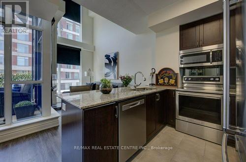 304 - 1940 Ironstone Drive, Burlington (Uptown), ON - Indoor Photo Showing Kitchen With Double Sink