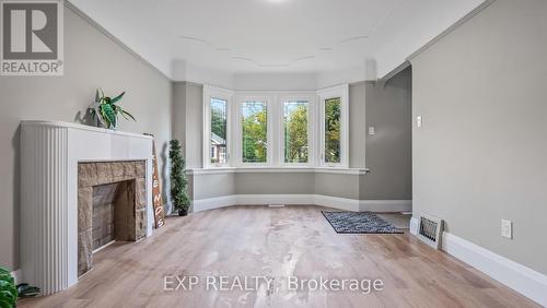 139 Longwood Road N, Hamilton (Westdale), ON - Indoor Photo Showing Other Room With Fireplace