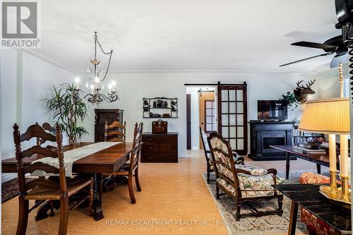 501 - 9 Grant Boulevard, Hamilton, ON - Indoor Photo Showing Dining Room With Fireplace