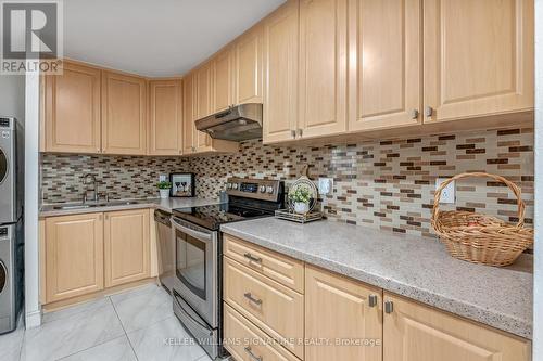 203 - 3700 Kaneff Crescent, Mississauga, ON - Indoor Photo Showing Kitchen With Stainless Steel Kitchen