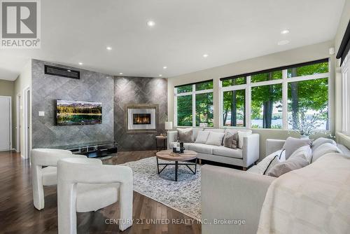 75 Darling Drive, Smith-Ennismore-Lakefield, ON - Indoor Photo Showing Living Room With Fireplace