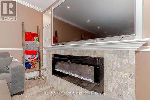 22 Mcintyre Lane, East Luther Grand Valley, ON - Indoor Photo Showing Living Room With Fireplace