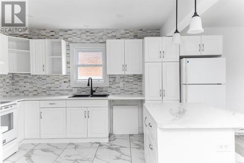 44 Market St, Sault Ste. Marie, ON - Indoor Photo Showing Kitchen With Double Sink