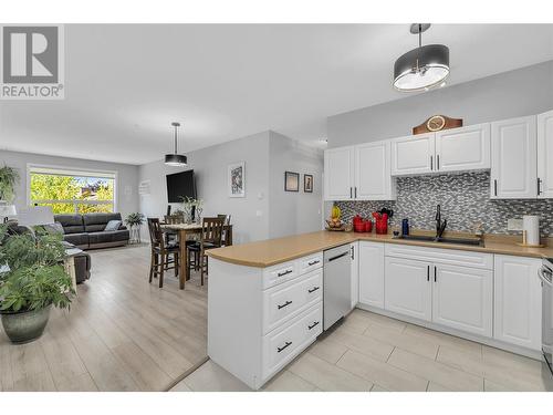 778 Rutland Road N Unit# 206, Kelowna, BC - Indoor Photo Showing Kitchen With Double Sink