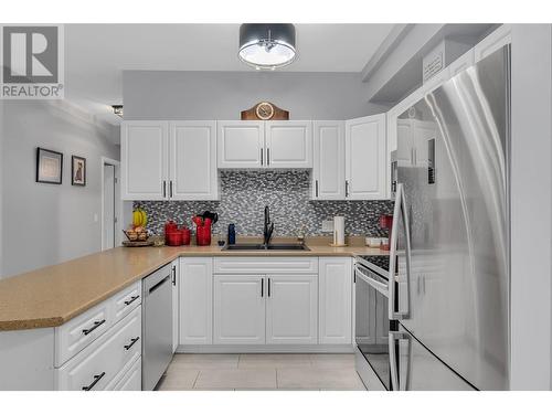 778 Rutland Road N Unit# 206, Kelowna, BC - Indoor Photo Showing Kitchen With Double Sink