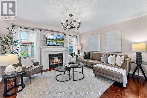 130 Worden Drive, Clarington (Courtice), ON - Indoor Photo Showing Living Room With Fireplace