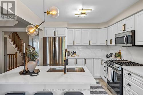 130 Worden Drive, Clarington (Courtice), ON - Indoor Photo Showing Kitchen With Stainless Steel Kitchen With Double Sink With Upgraded Kitchen