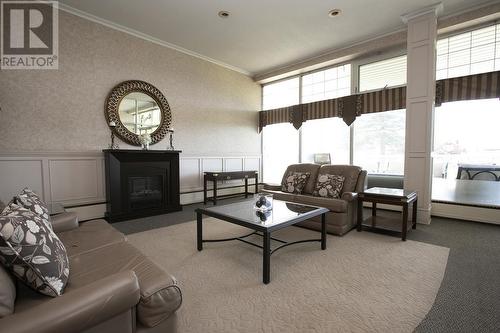 99 Pine St # 308, Sault Ste. Marie, ON - Indoor Photo Showing Living Room With Fireplace