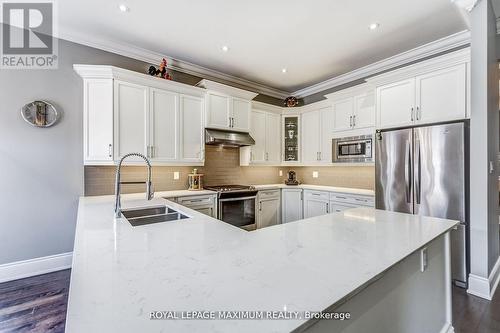 35 Eiffel Boulevard, Brampton (Vales Of Castlemore North), ON - Indoor Photo Showing Kitchen With Stainless Steel Kitchen With Double Sink With Upgraded Kitchen