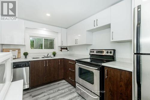 1221 River Road E, Wasaga Beach, ON - Indoor Photo Showing Kitchen With Stainless Steel Kitchen With Double Sink