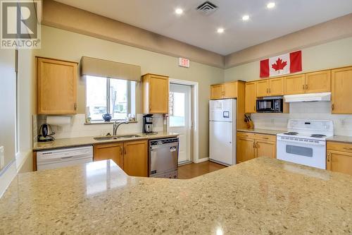 4074 Gellatly Road Unit# 126, West Kelowna, BC - Indoor Photo Showing Kitchen With Double Sink