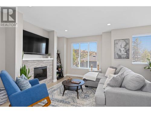 2490 Tuscany Drive Unit# 7, West Kelowna, BC - Indoor Photo Showing Living Room With Fireplace