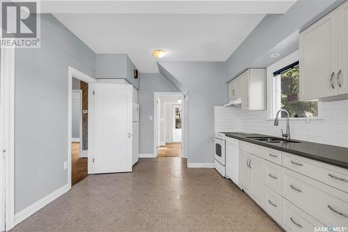 1207 Elliott Street, Saskatoon, SK - Indoor Photo Showing Kitchen With Double Sink