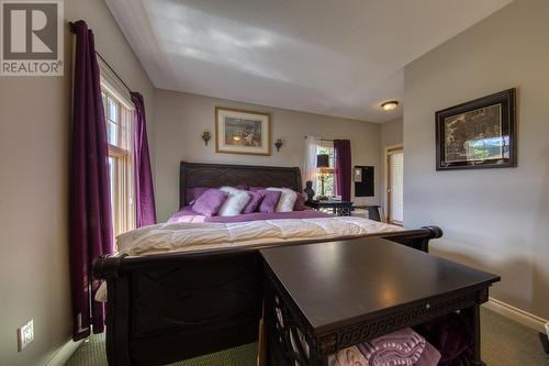 5090 Riverside  Drive, Fairmont Hot Springs, BC - Indoor Photo Showing Bedroom