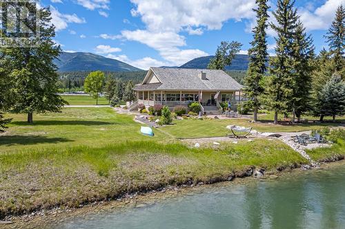 5090 Riverside  Drive, Fairmont Hot Springs, BC - Outdoor With Body Of Water With Deck Patio Veranda With View