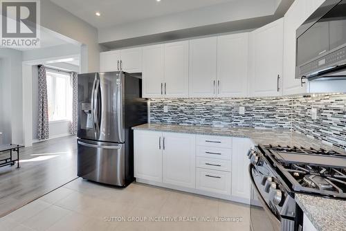 24 Sasco Way, Essa, ON - Indoor Photo Showing Kitchen With Stainless Steel Kitchen With Upgraded Kitchen