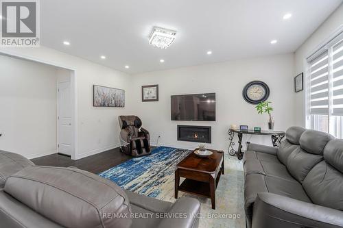 53 Ash Hill Avenue, Caledon, ON - Indoor Photo Showing Living Room With Fireplace