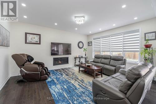 53 Ash Hill Avenue, Caledon, ON - Indoor Photo Showing Living Room With Fireplace