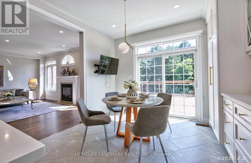 57 Castleglen Boulevard, Markham, ON - Indoor Photo Showing Dining Room With Fireplace