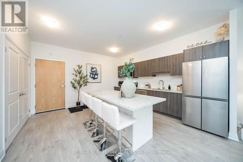 201 - 64 Queen Street S, New Tecumseth (Tottenham), ON - Indoor Photo Showing Kitchen